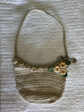 The Sak Cream Crochet Shoulder Bag with Yellow Floral Appliqué
